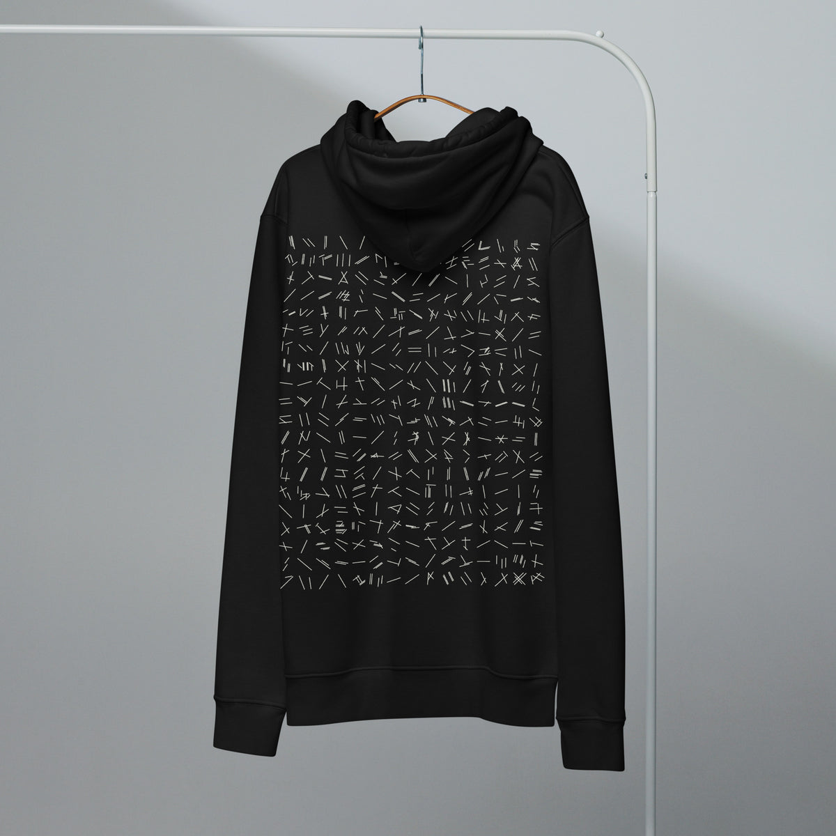 Language of Runways hoodie in black, back, on a hanger