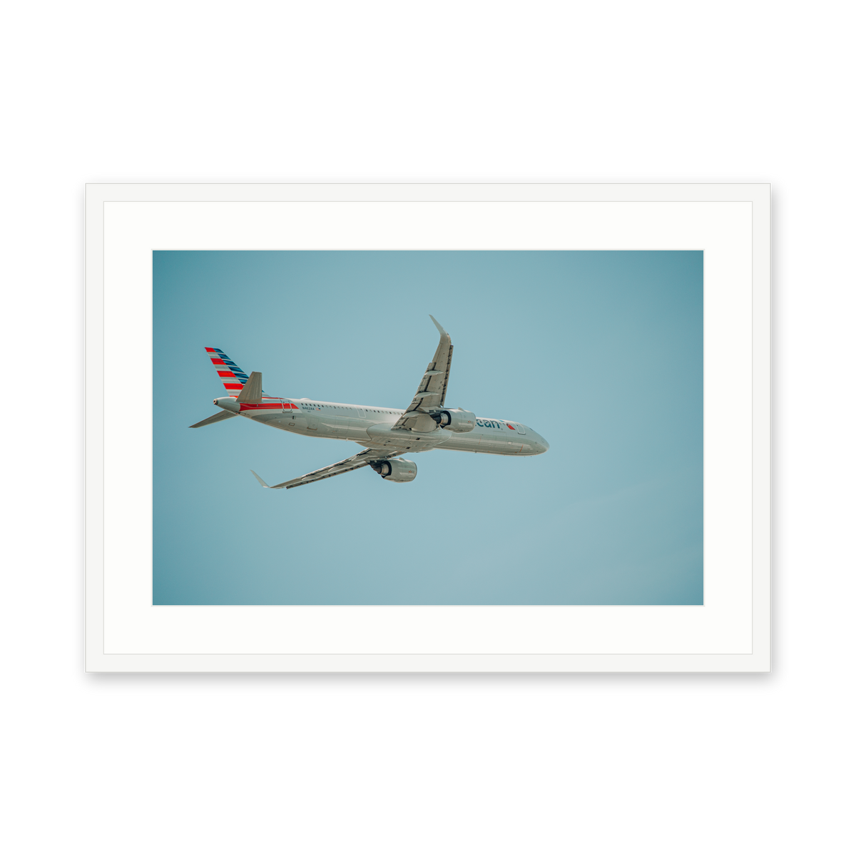 American Departure, framed in white