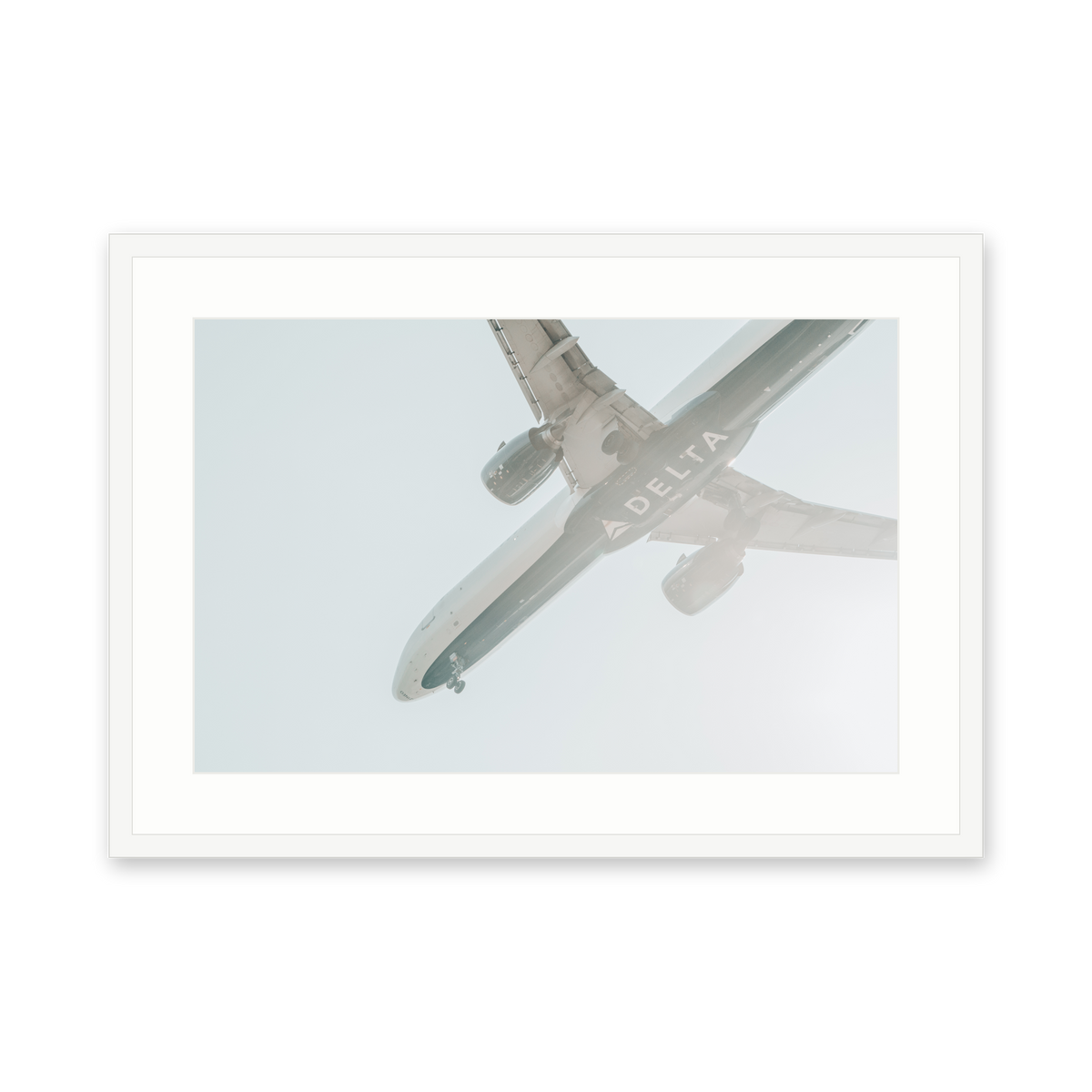 Delta in Haze, framed in white